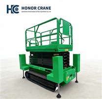 Plate-forme élévatrice à ciseaux surélevée sur chenilles